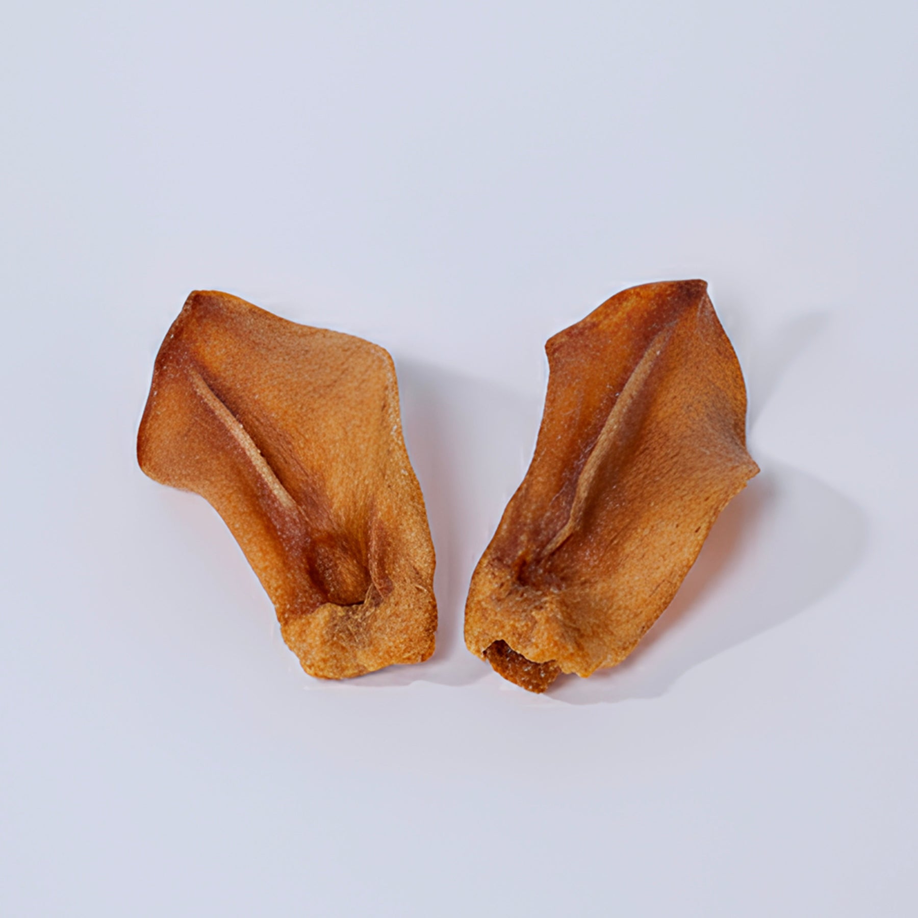 Orelha Suína Desidratada e Defumada para Cães, Petisco Natural de Mastigação Prolongada